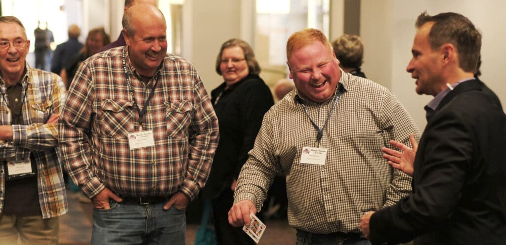 David Farr performing strolling magic at a conference