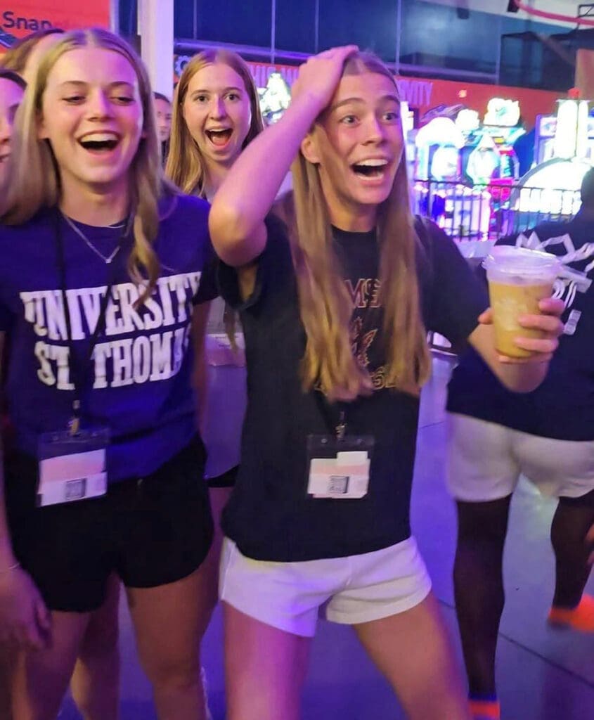 Students reacting with shock to a magic performance